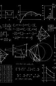 Lavagna con diversi calcoli e diagrammi di fisica